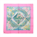 Hermès Carré 90 Giverny silk scarf with bright pink border, blue-green garden scene, floral motifs and decorative bridge design.