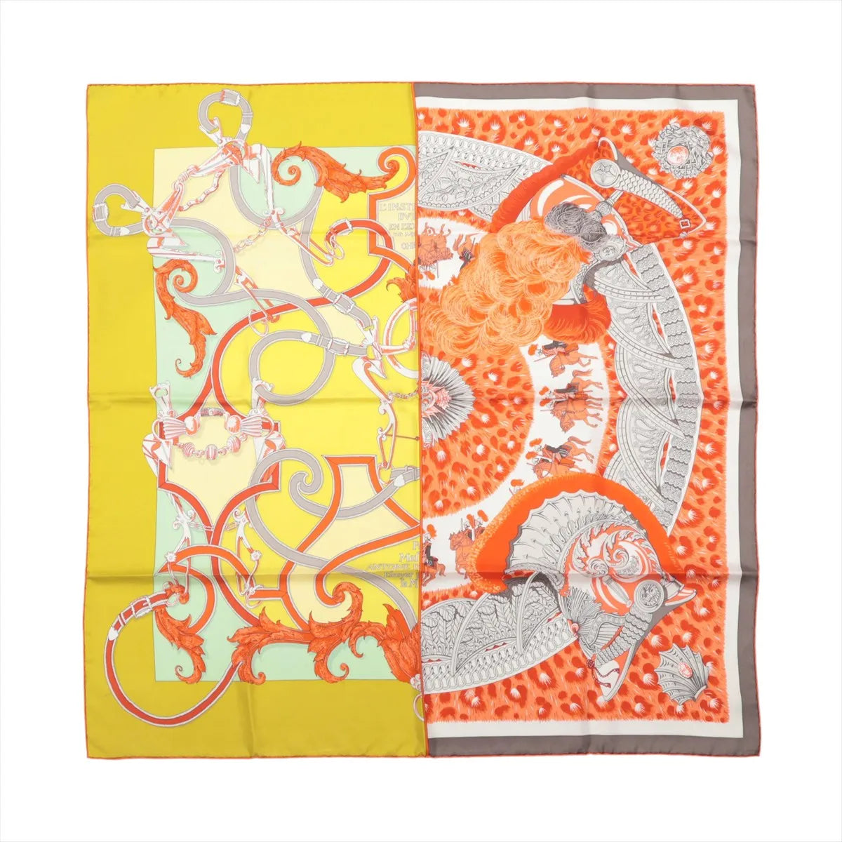 Hermès Carré 90 silk scarf with split yellow and orange design, ornate harness motifs, gray detailing and elaborate feathered ceremonial elements.