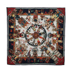 Hermès Kachinas silk scarf with navy blue border, colorful ceremonial figures, feathered headdresses and red, green and cream geometric motifs.