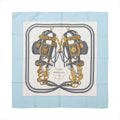 Hermès Brides de Gala silk scarf with light blue border, ivory center, gray equestrian bridles and ornate gold hardware details.